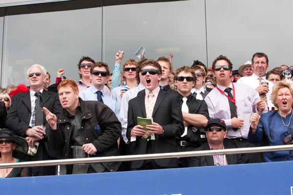 Enthusiastic Punters enjoying a beautiful day at the races.